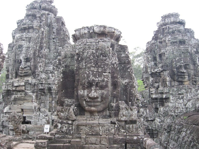 Bayon Temple, where mysterious smiling faces can be found.