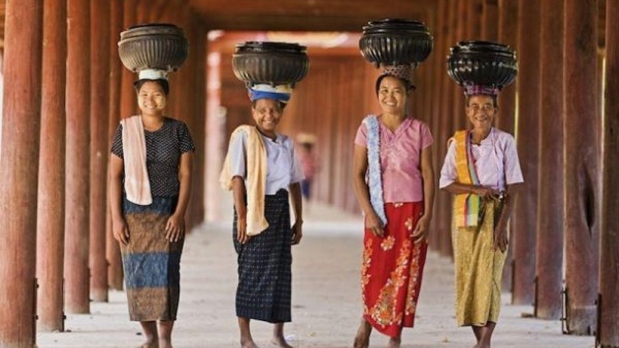 The mystical beauty in traditional Myanmar attire.