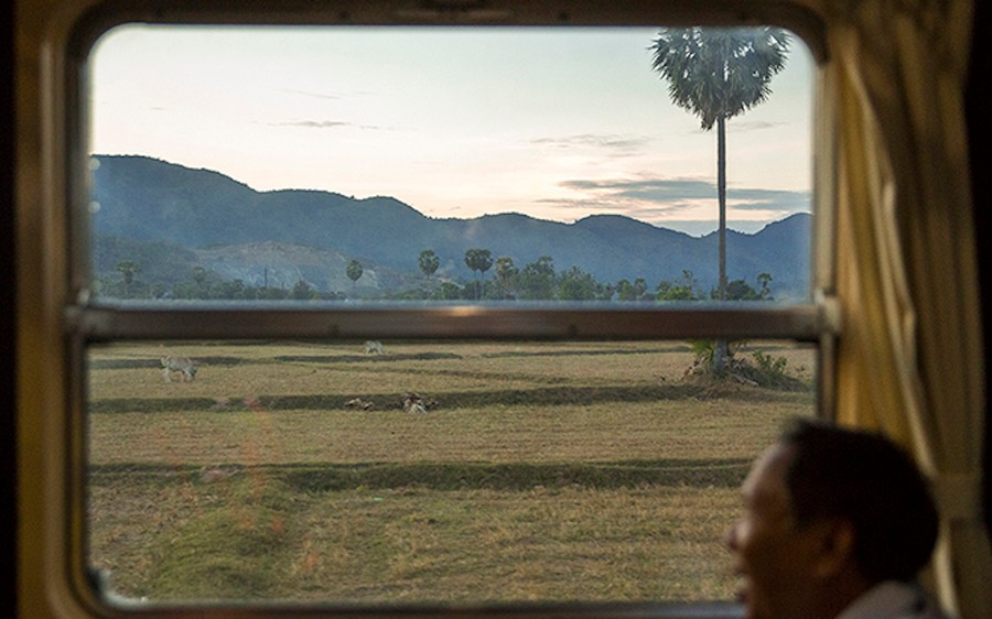 The rural Cambodian scenery through the train window.