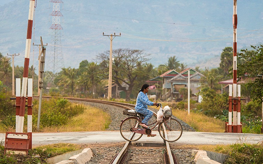 The train route runs from urban areas to rural ones.