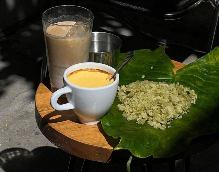 Savoring a cup of coffee along with a bit of sticky rice is a perfect way to start a new day.